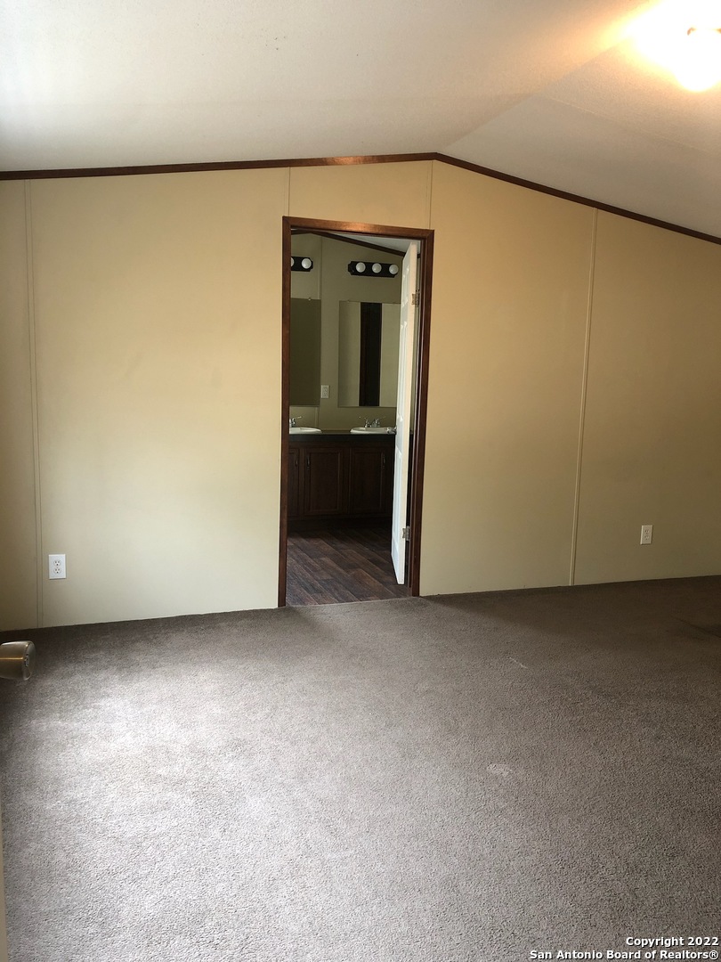 1914 14th Street, Unit 10 Hondo, TX 78861 - Photo 11 of 13 a view of an empty room