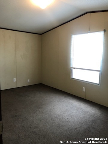 1914 14th Street, Unit 10 Hondo, TX 78861 - Photo 8 of 13 a view of an empty room with a window