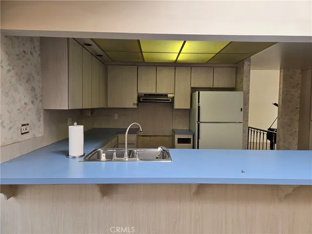 a view of a room with wall and a window