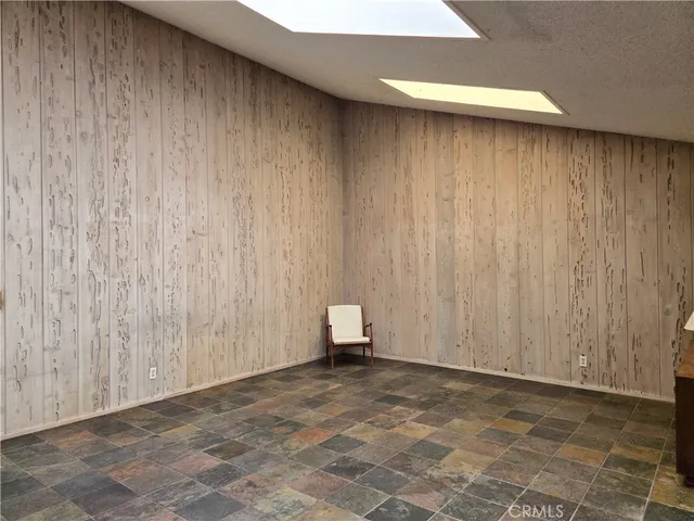 a bathroom with a shower and a bath tub