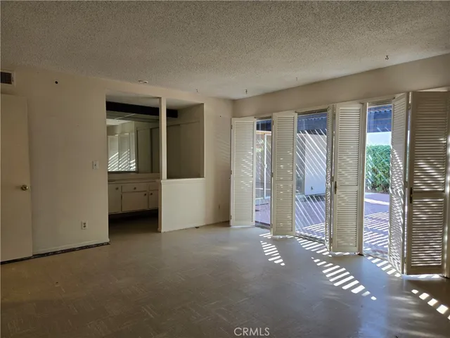 a bathroom with a shower and a toilet