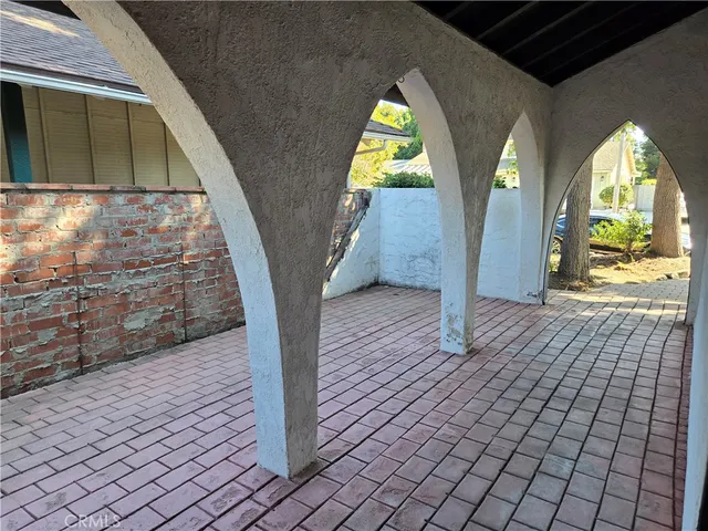 a view of entryway with wooden door