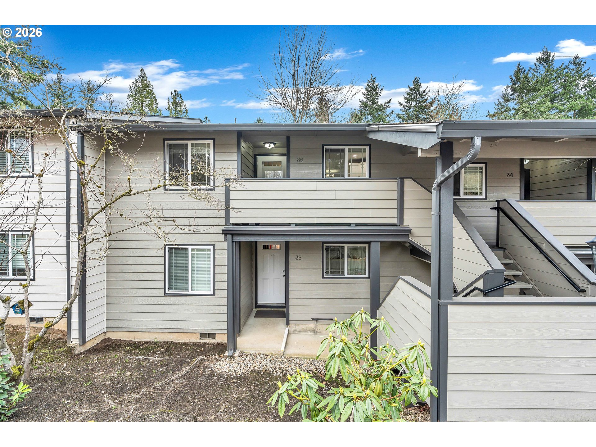 29700 Southwest Courtside Drive, Unit 36 Wilsonville, OR 97070 - Photo 1 of 40 a view of a house with a patio