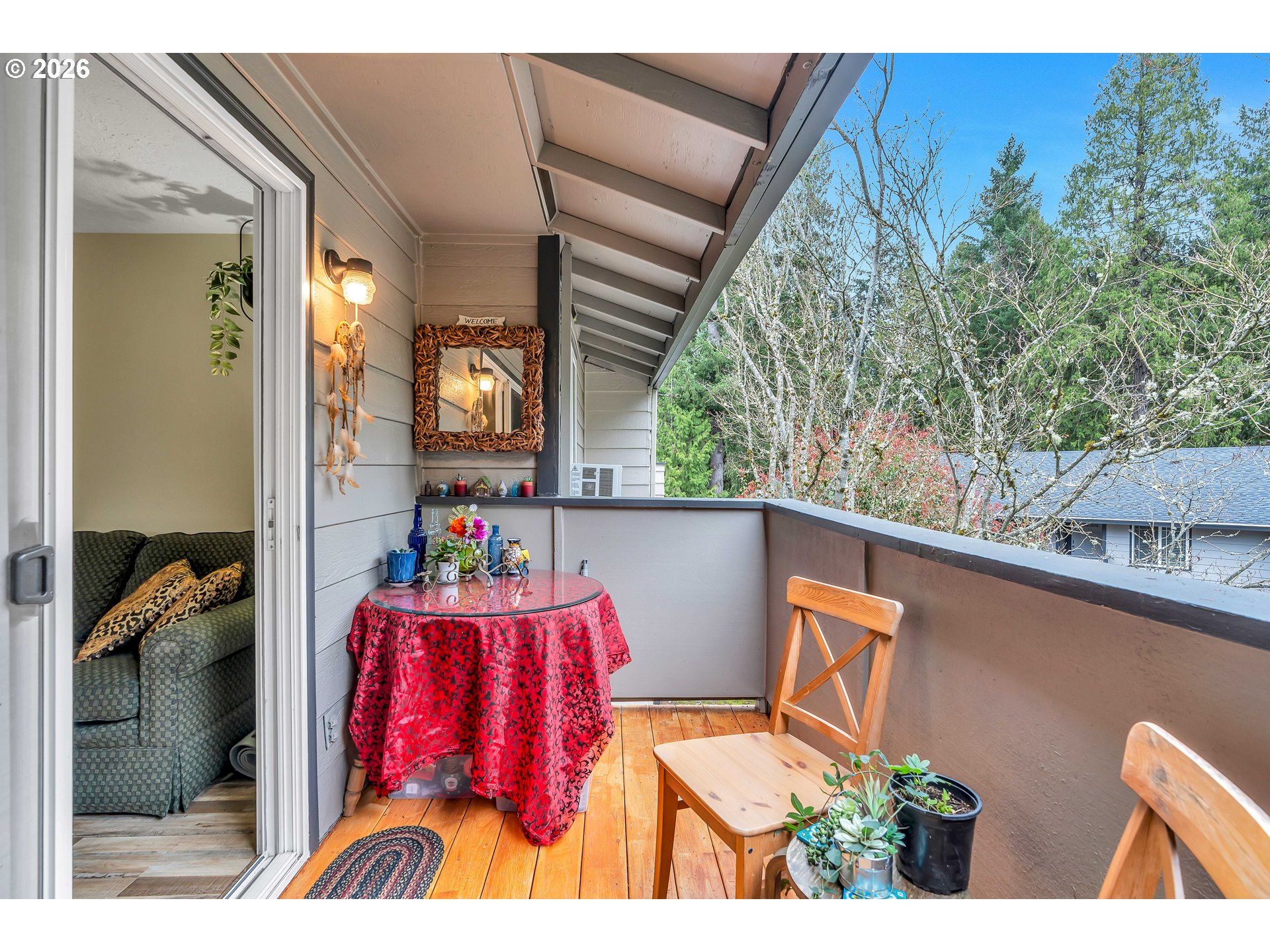 29700 Southwest Courtside Drive, Unit 36 Wilsonville, OR 97070 - Photo 15 of 40 a view of two chairs in a balcony