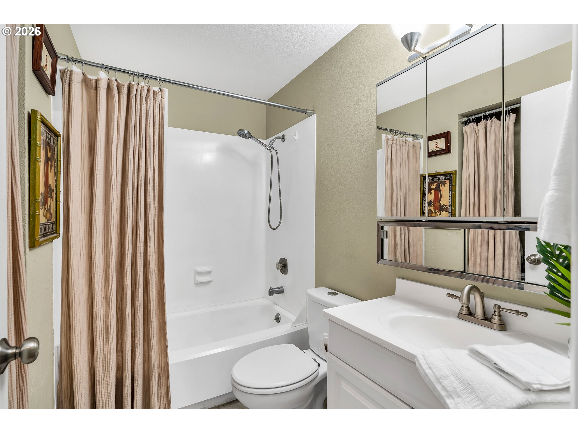 29700 Southwest Courtside Drive, Unit 36 Wilsonville, OR 97070 - Photo 17 of 40 a bathroom with a granite countertop sink toilet and shower