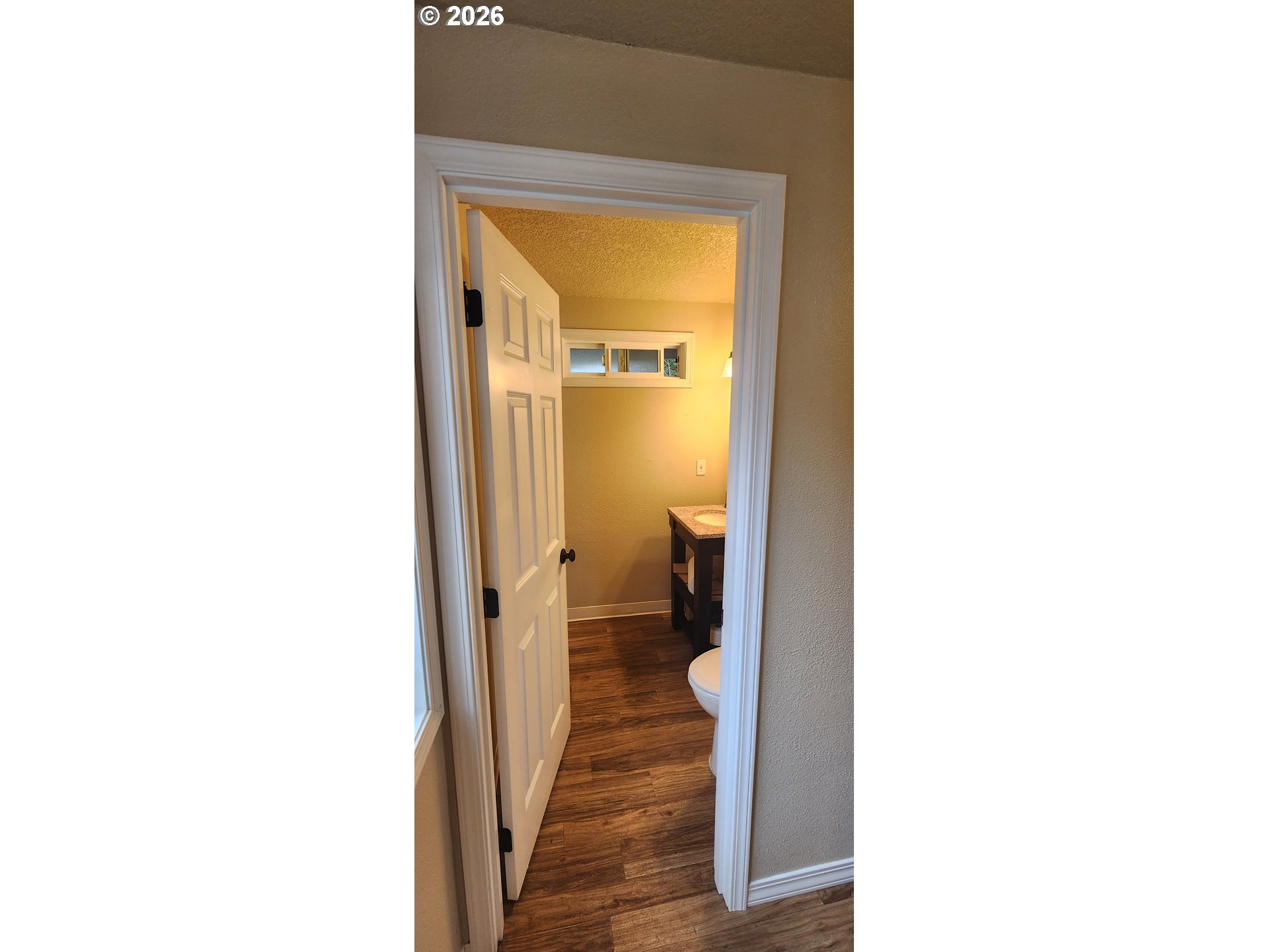 29700 Southwest Courtside Drive, Unit 36 Wilsonville, OR 97070 - Photo 31 of 40 a view of a hallway with a room and a room
