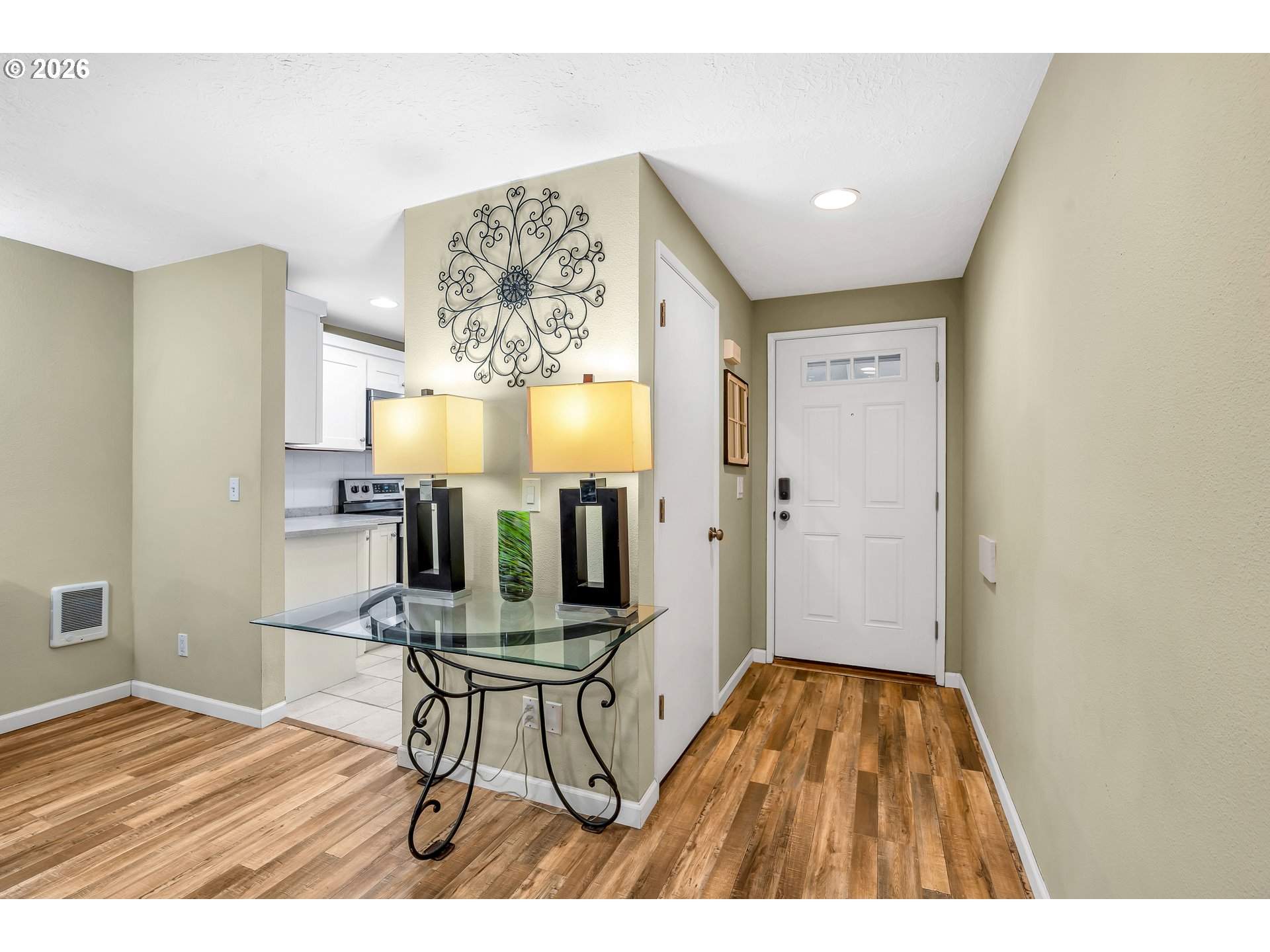 29700 Southwest Courtside Drive, Unit 36 Wilsonville, OR 97070 - Photo 6 of 40 a room with furniture and view of kitchen