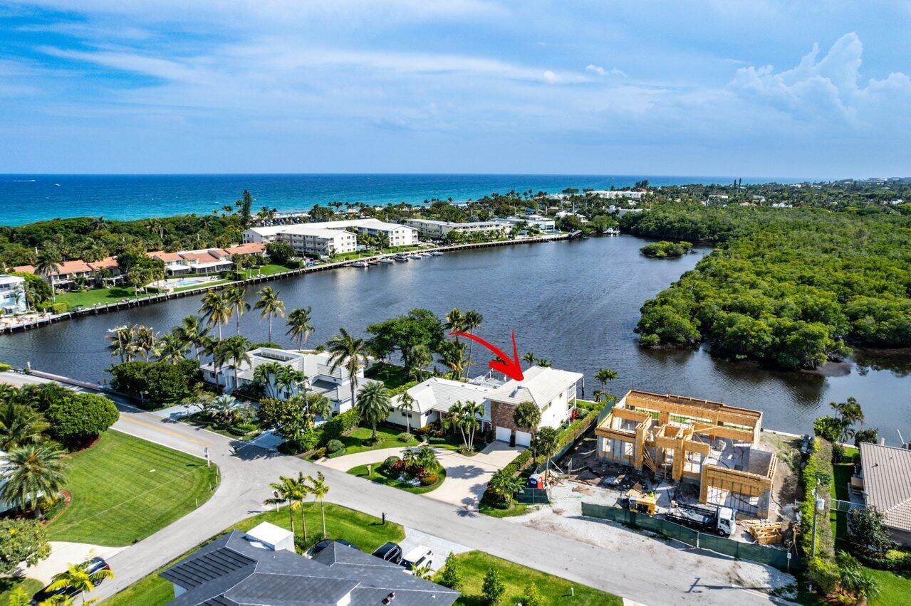 2 Inlet Cay Drive Ocean Ridge, FL 33435 - Photo 1 of 22 an aerial view of lake and houses with outdoor space