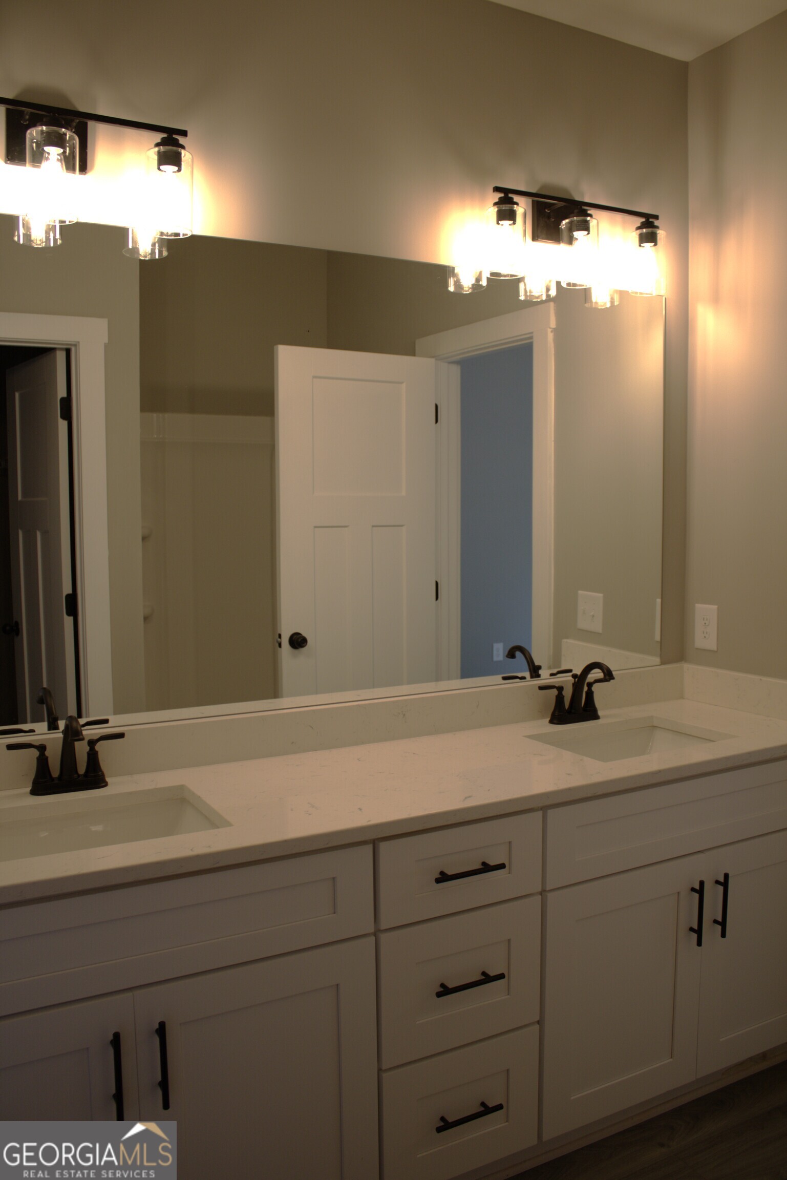 247 North Point Circle Hartwell, GA 30643 - Photo 12 of 18 a bathroom with a sink and mirror