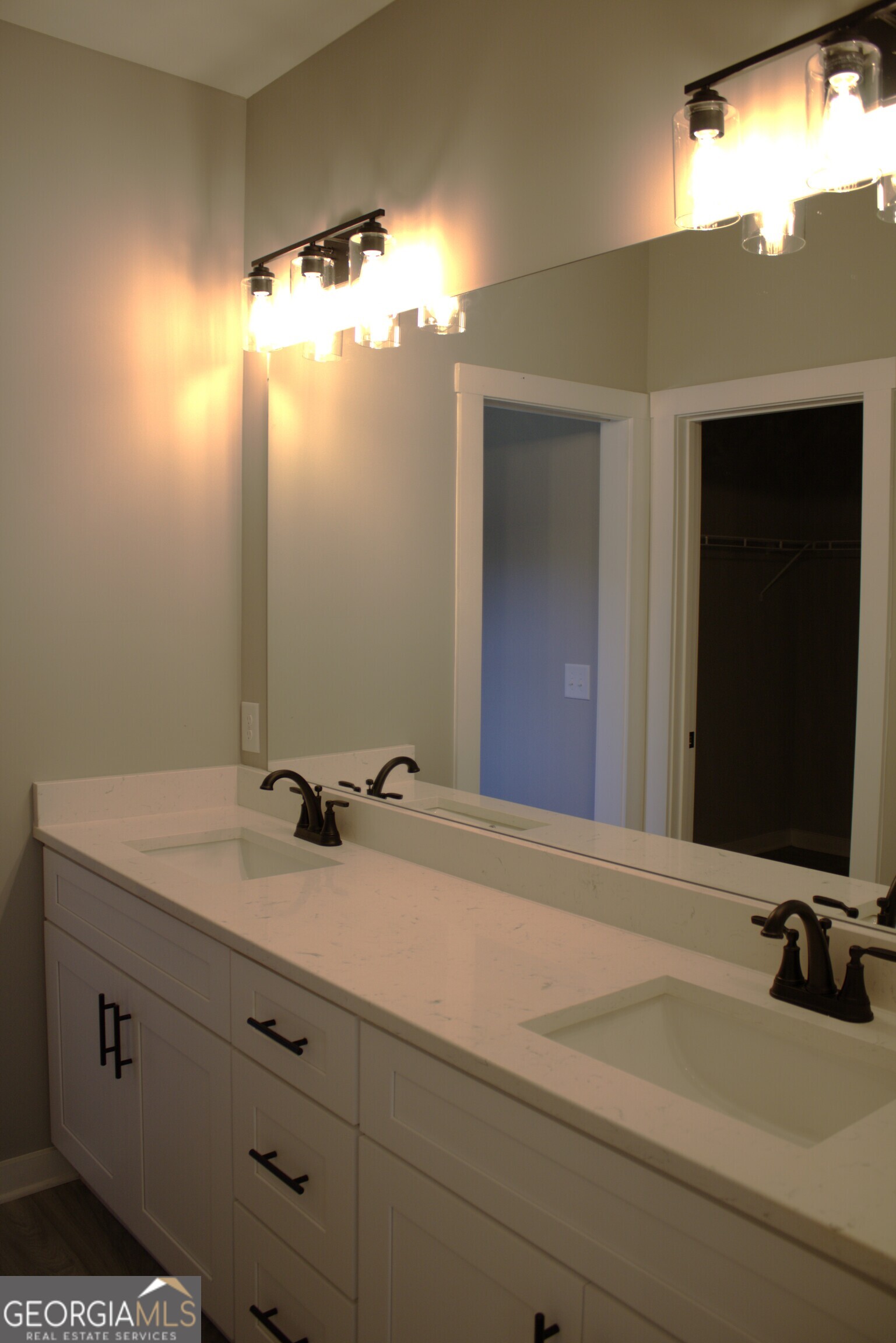 247 North Point Circle Hartwell, GA 30643 - Photo 14 of 18 a bathroom with a sink and a mirror