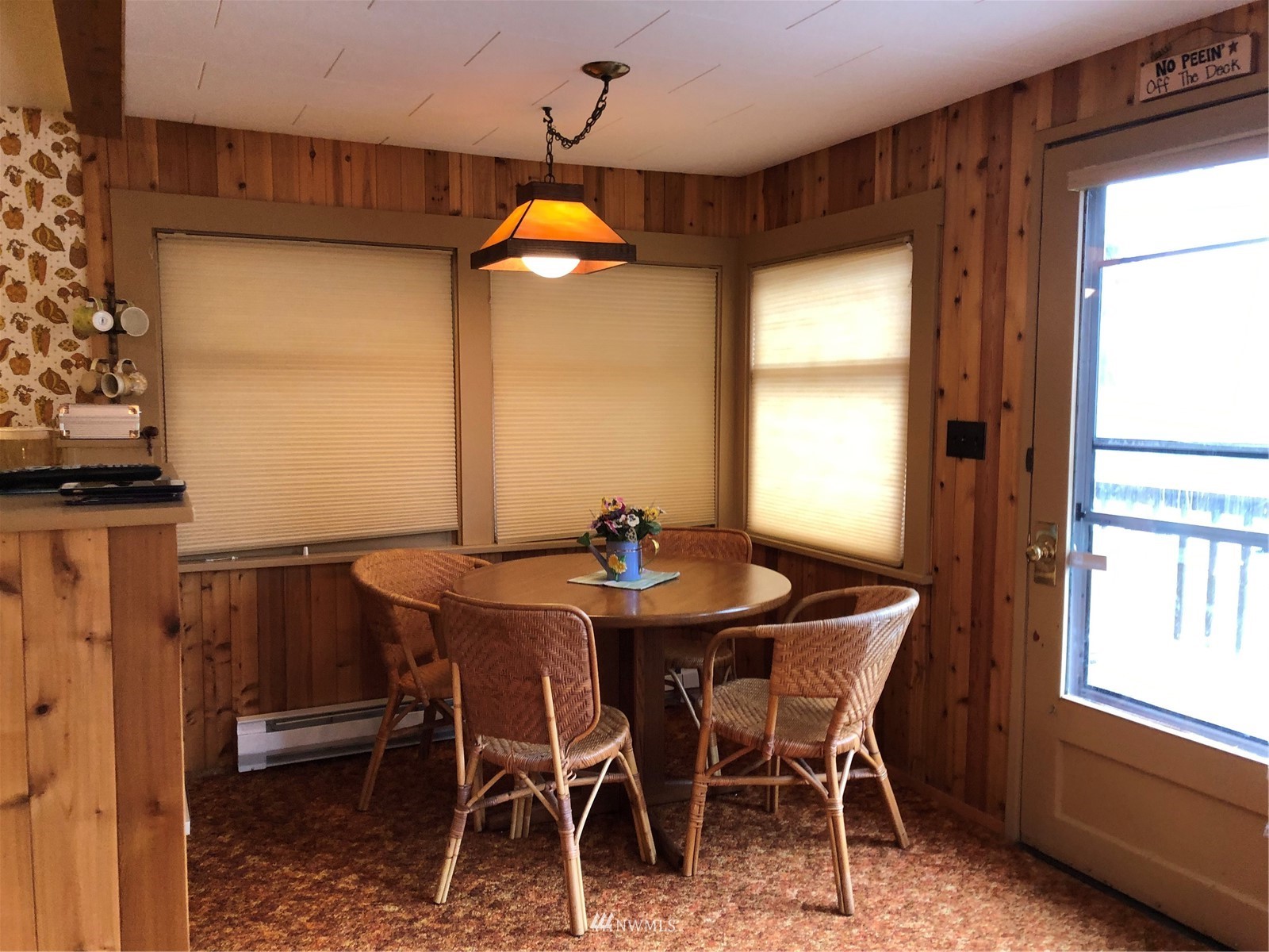 2709 Southwest Lake Roesiger Road Snohomish, WA 98290 - Photo 3 of 10 a view of a dining room with furniture and window
