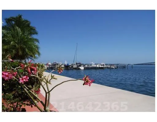 a swimming pool with outdoor seating and yard