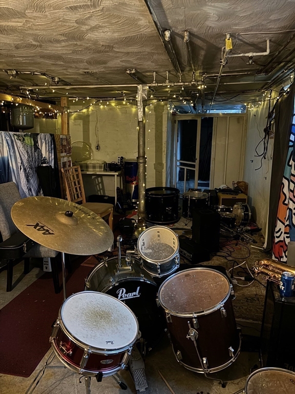 16 Caltha Road Boston, MA 02135 - Photo 11 of 13 a view of a dining room with furniture