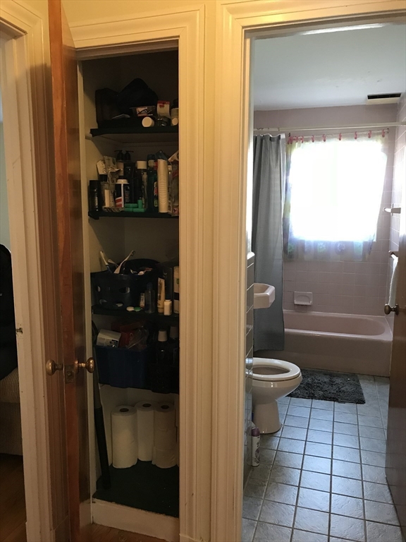 16 Caltha Road Boston, MA 02135 - Photo 12 of 13 a bathroom with a toilet and a shower