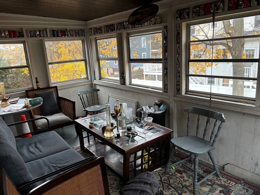 16 Caltha Road Boston, MA 02135 - Photo 4 of 13 a living room with furniture and a window