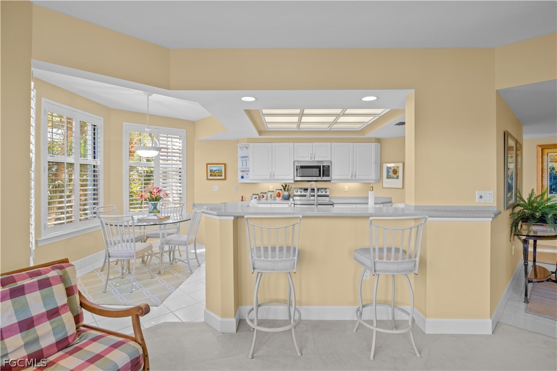 2619 Wulfert Road, Unit 3 Sanibel, FL 33957 - Photo 27 of 42 a room with table chairs and entryway