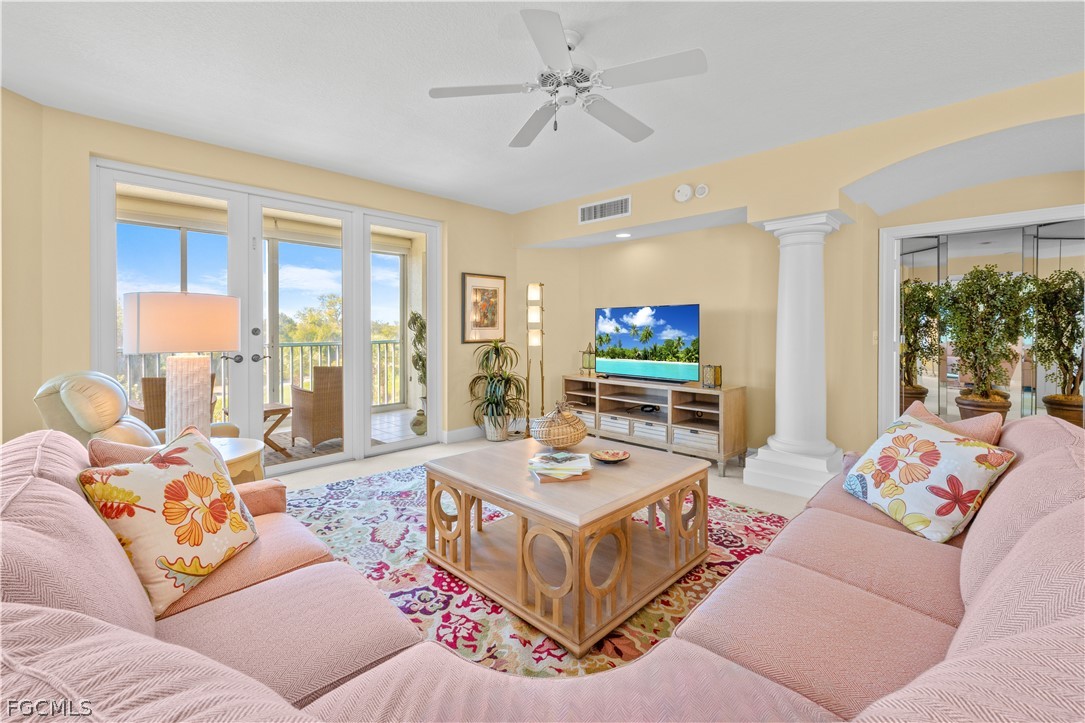 2619 Wulfert Road, Unit 3 Sanibel, FL 33957 - Photo 3 of 42 a living room with furniture and a flat screen tv