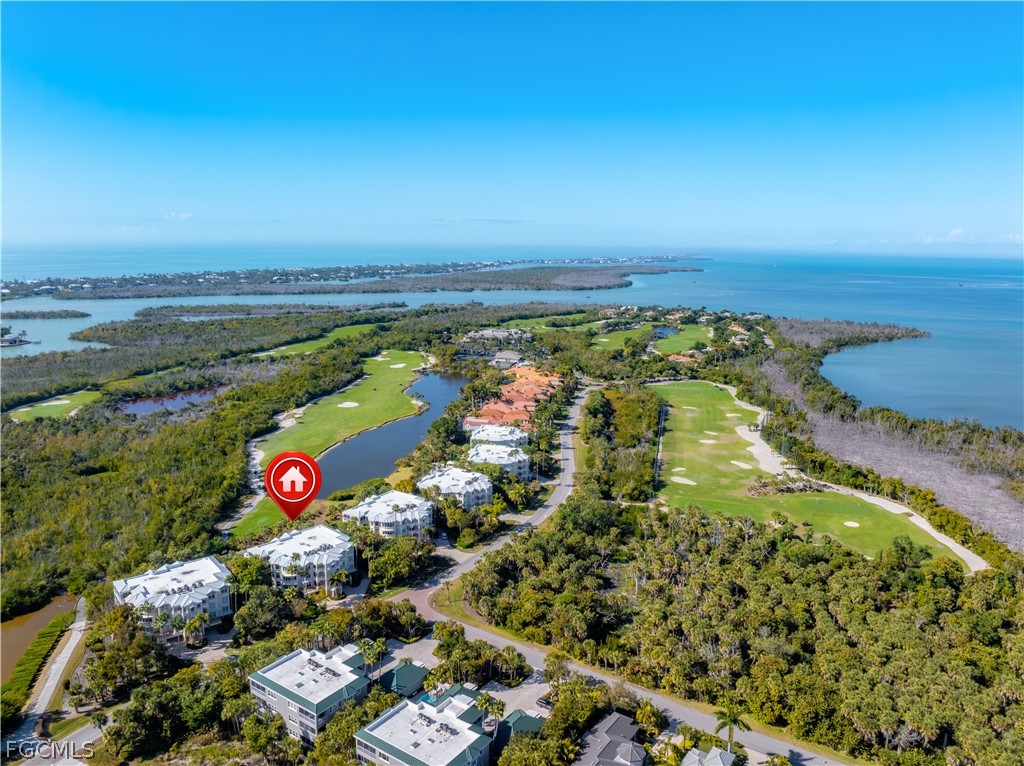 2619 Wulfert Road, Unit 3 Sanibel, FL 33957 - Photo 34 of 42 an aerial view of residential houses with outdoor space