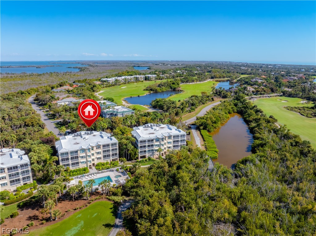 2619 Wulfert Road, Unit 3 Sanibel, FL 33957 - Photo 37 of 42 an aerial view of a residential houses with outdoor space and swimming pool