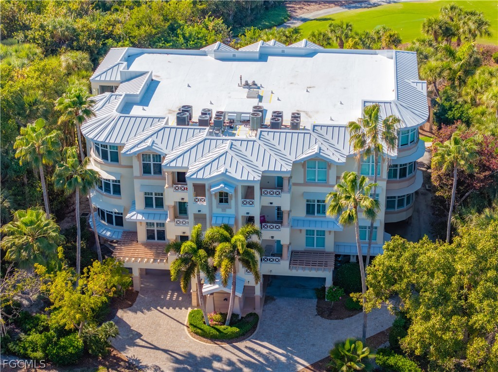 2619 Wulfert Road, Unit 3 Sanibel, FL 33957 - Photo 41 of 42 a view of a house with yard and sitting area