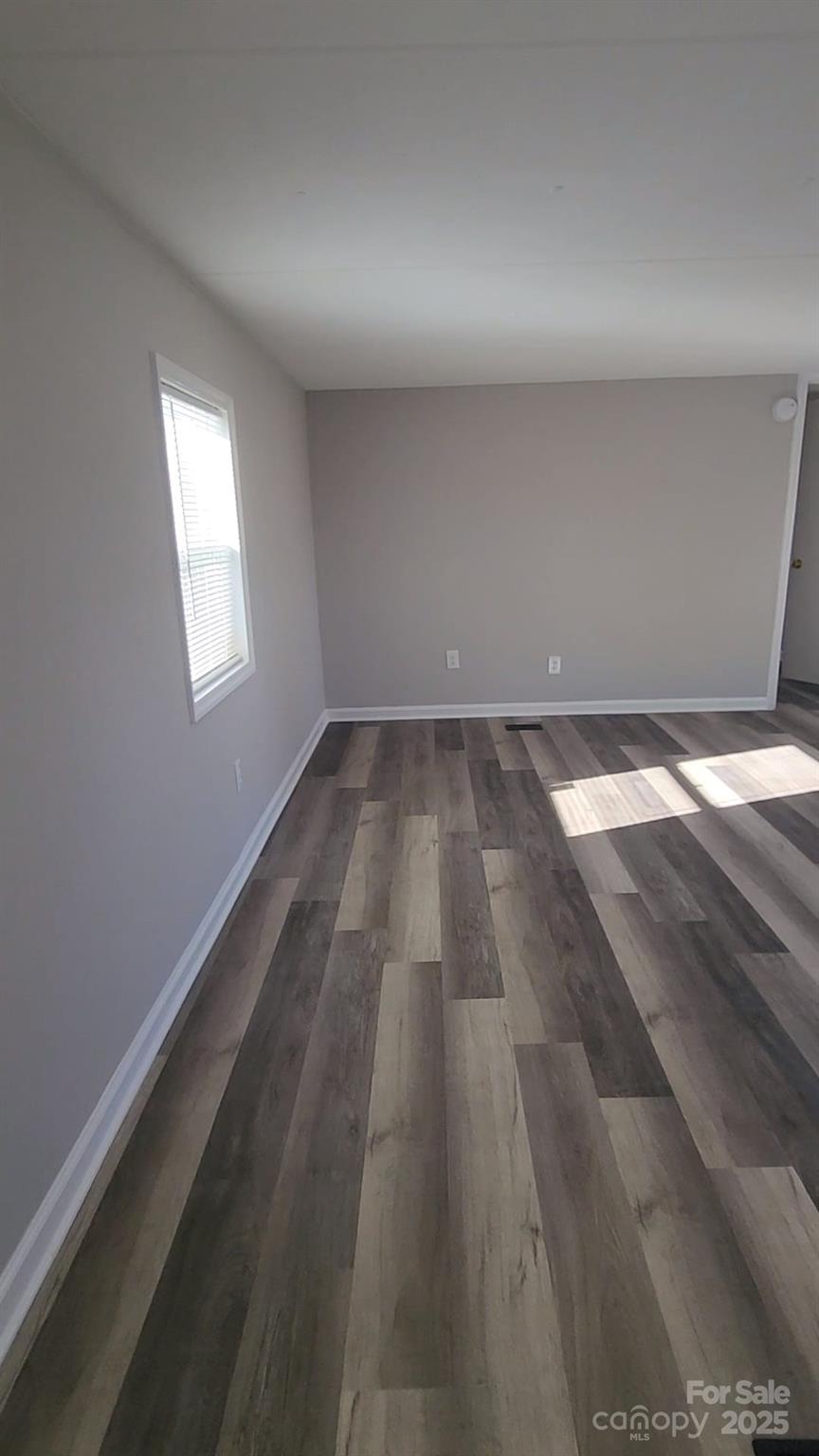 440 Ridgeland Drive Cleveland, NC 27013 - Photo 6 of 8 a view of an empty room and window