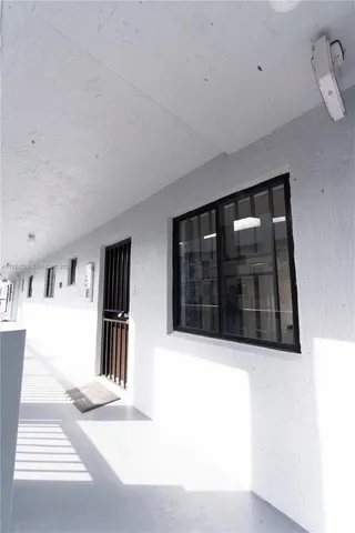 a view of a livingroom and a window