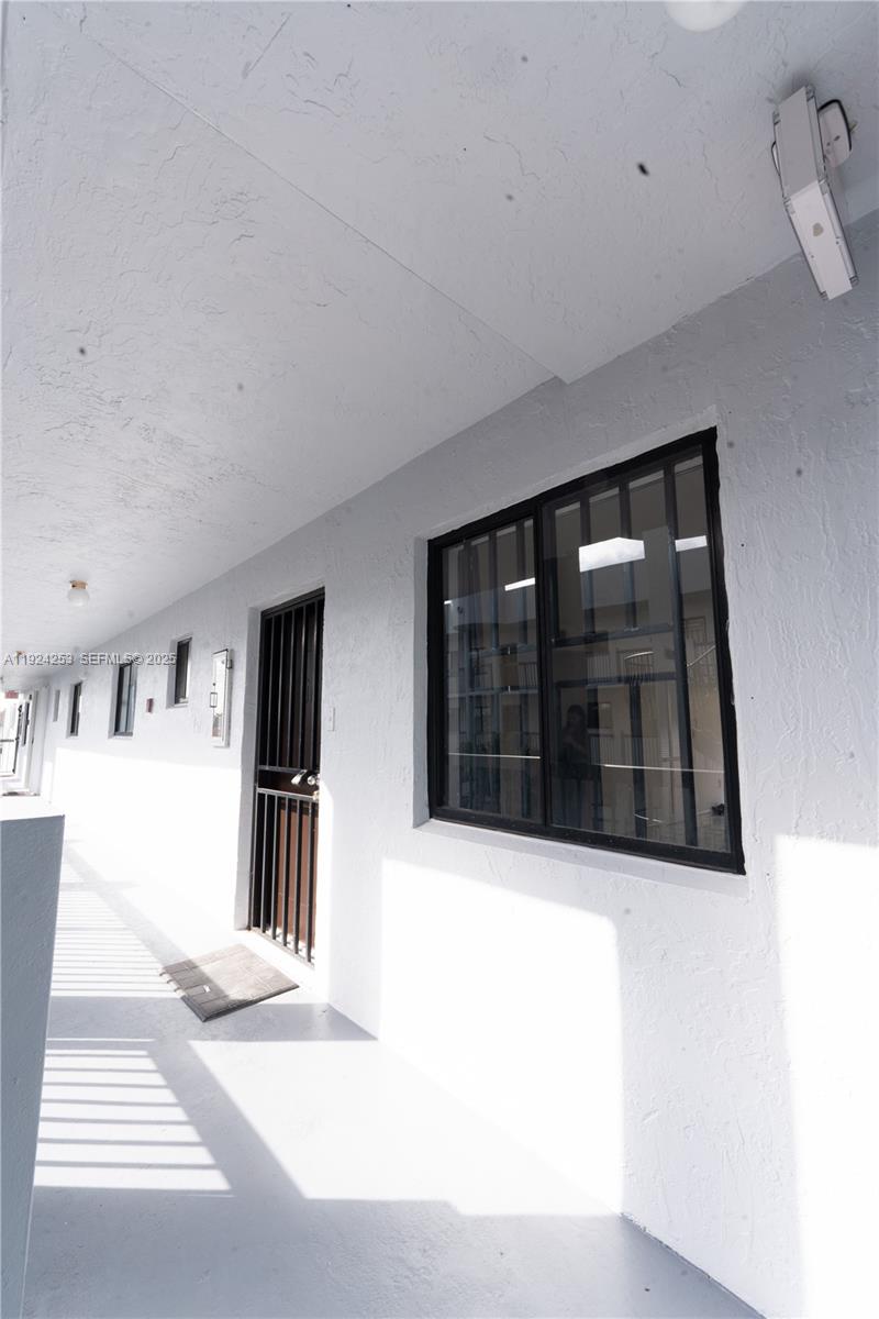 a view of a livingroom and a window