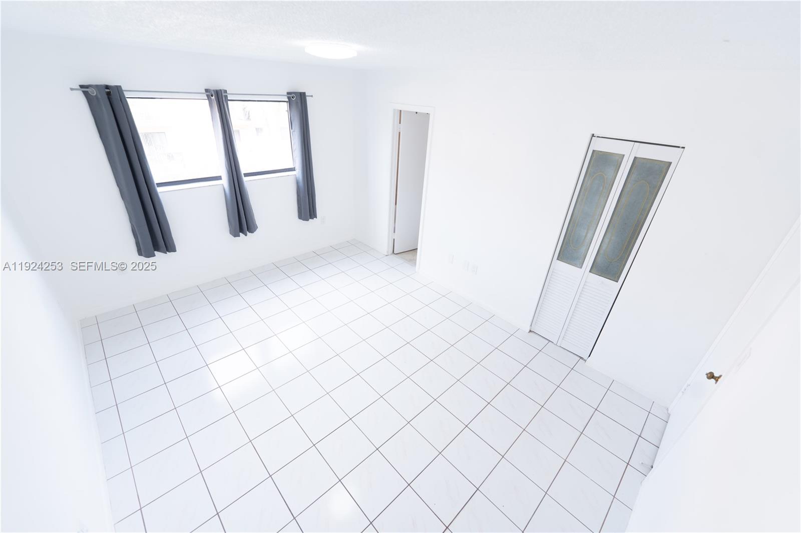 5300 West 21st Court, Unit 311 Hialeah, FL 33016 - Photo 6 of 10 a view of an empty room