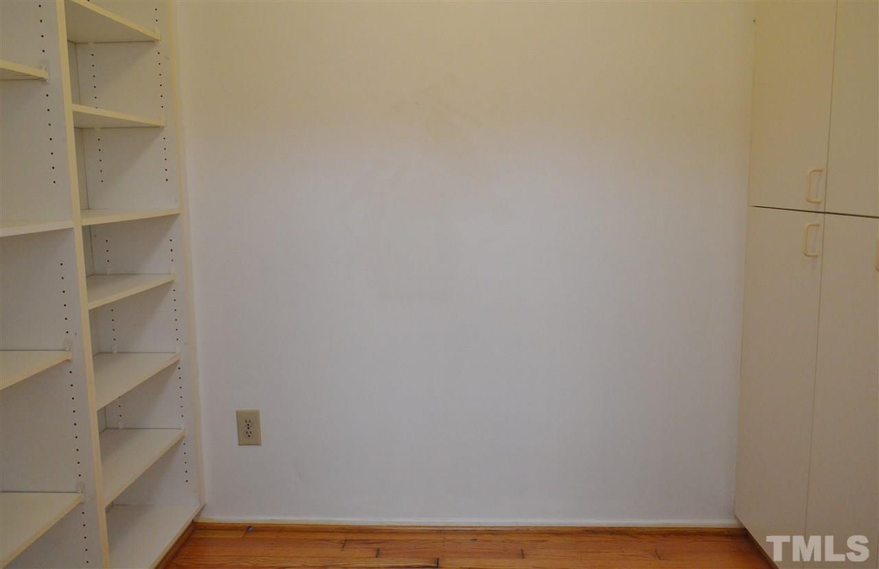 3104 Chancery Place Raleigh, NC 27607 - Photo 11 of 25 The butlers pantry has ton's of storage. It also has hardwood floors.