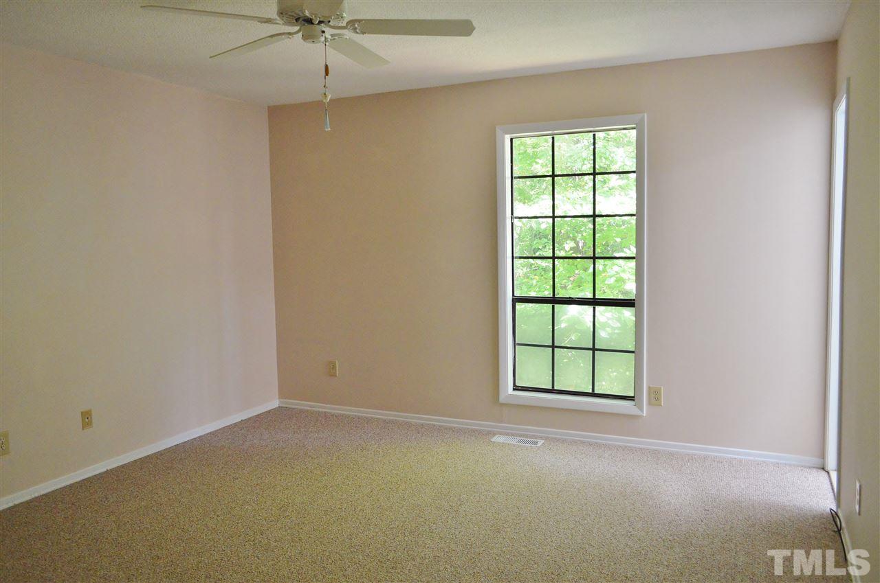 3104 Chancery Place Raleigh, NC 27607 - Photo 14 of 25 The master bedroom has new carpet. It also has a spacious closet.