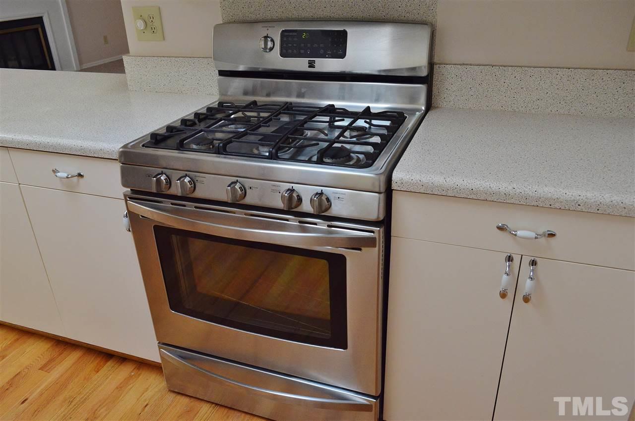3104 Chancery Place Raleigh, NC 27607 - Photo 9 of 25 A close up the stainless steel range.