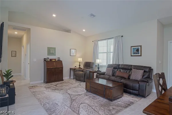 a living room with furniture or couch and a window