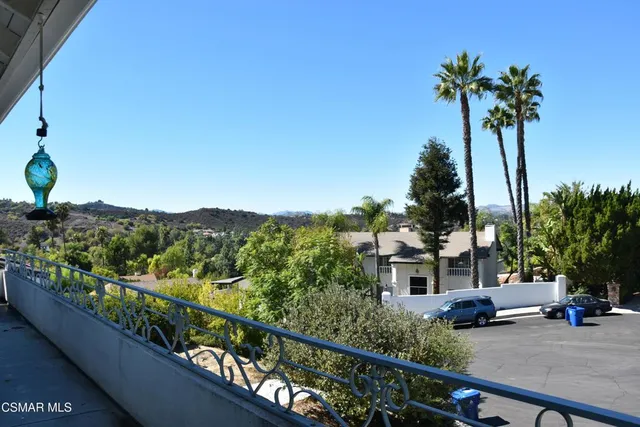a view of a city from a balcony