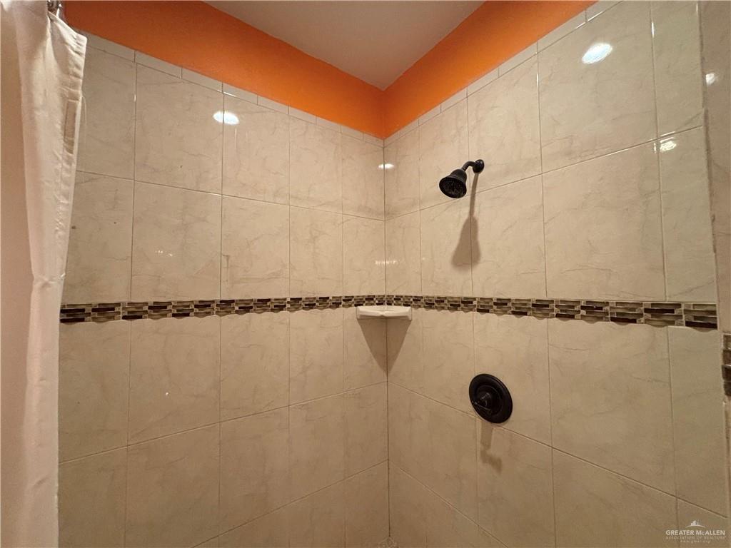45 Zinnia Street Rio Grande City, TX 78582 - Photo 11 of 31 a bathroom with a shower