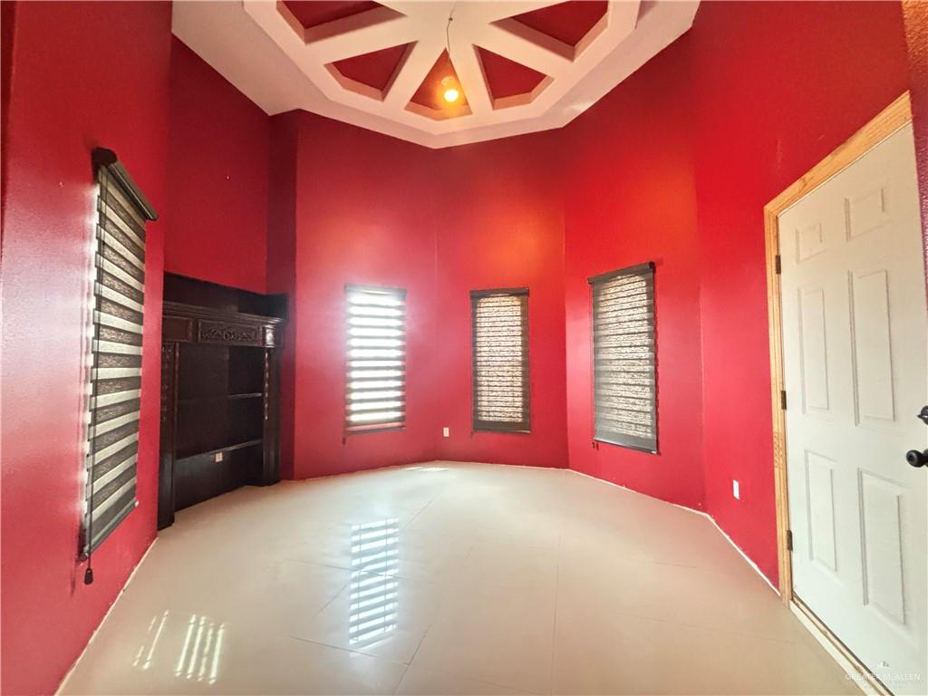 45 Zinnia Street Rio Grande City, TX 78582 - Photo 13 of 31 a view of an empty room with a window and dresser
