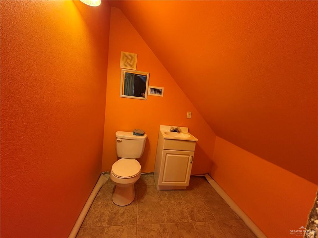 45 Zinnia Street Rio Grande City, TX 78582 - Photo 22 of 31 a bathroom with a toilet and a sink