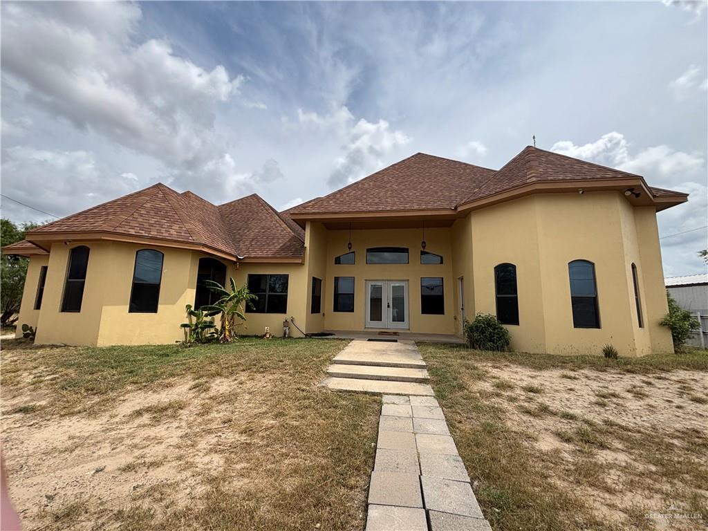 45 Zinnia Street Rio Grande City, TX 78582 - Photo 30 of 31 a front view of a house with yard