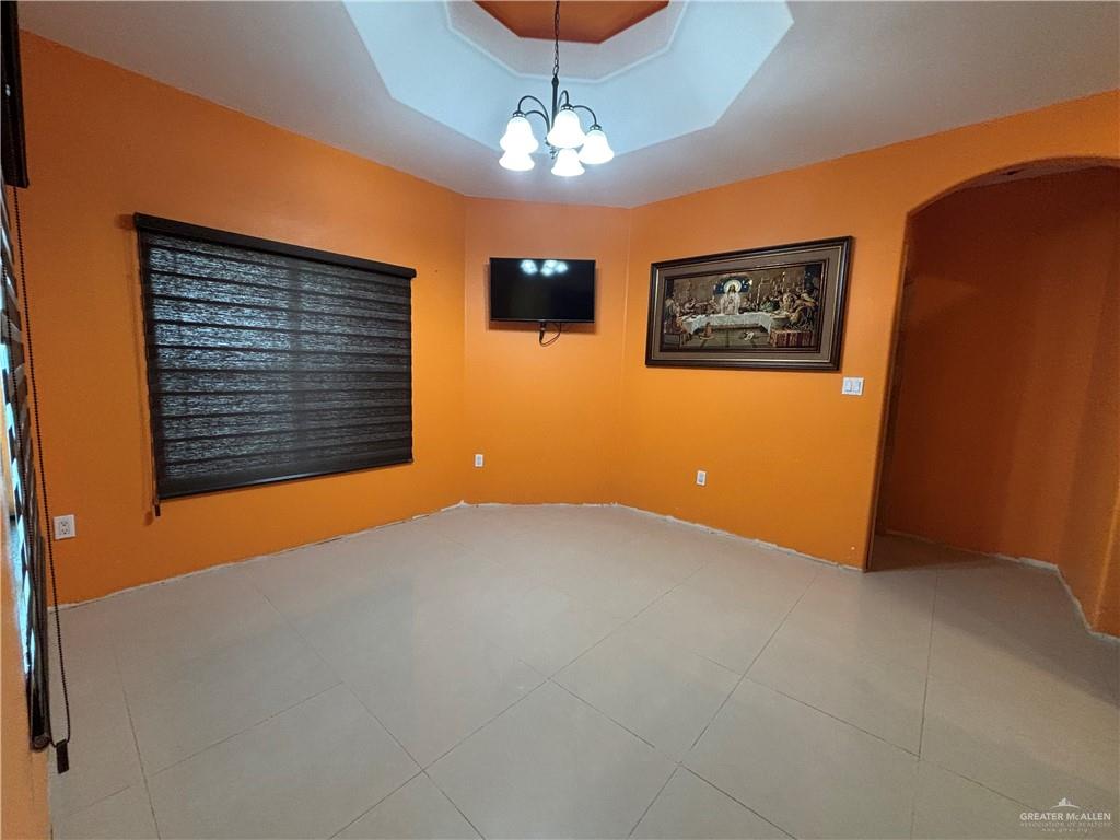 45 Zinnia Street Rio Grande City, TX 78582 - Photo 4 of 31 a view of a livingroom with a chandelier