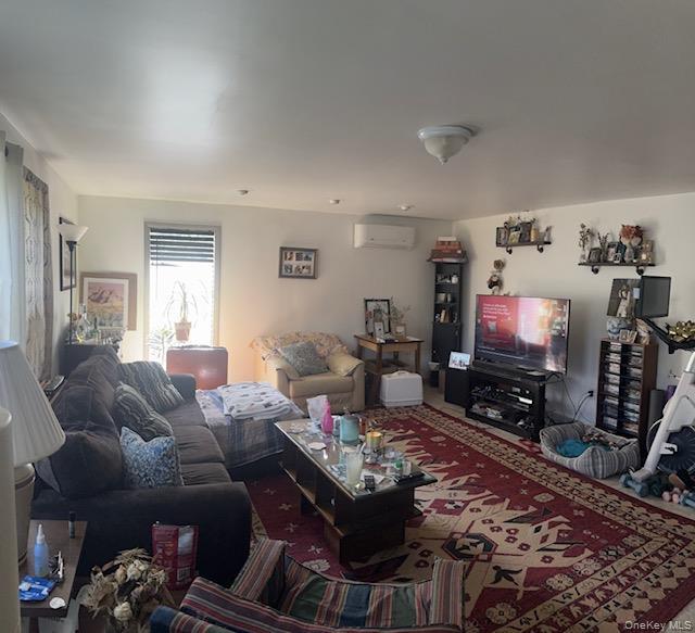 405 Burnt Hill Road Roscoe, NY 12776 - Photo 6 of 11 Living area with a wall mounted AC