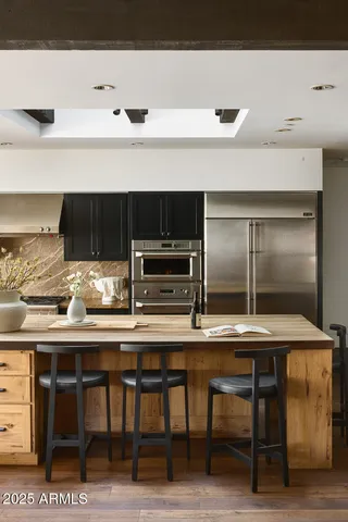 a view of kitchen island with furniture and window