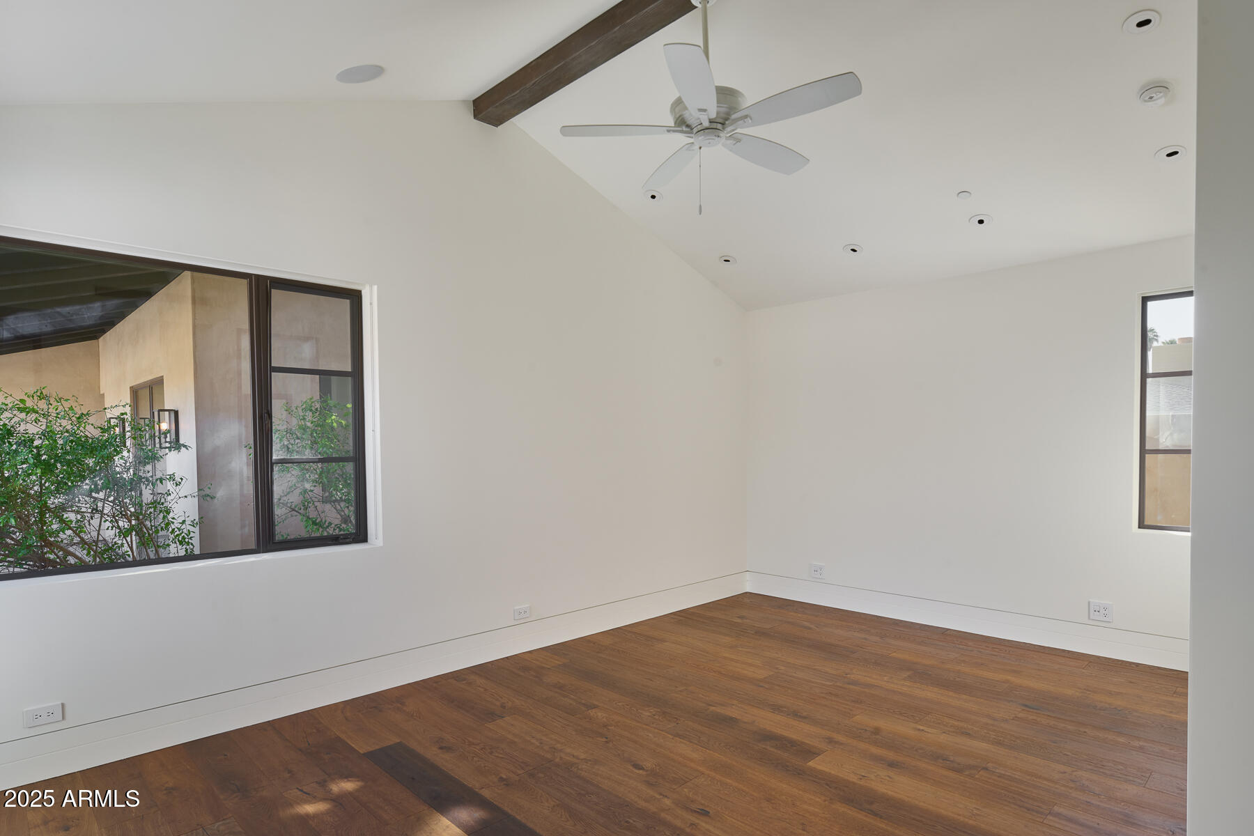 514 West Rose Lane Phoenix, AZ 85013 - Photo 38 of 64 wooden floor in an empty room with a window