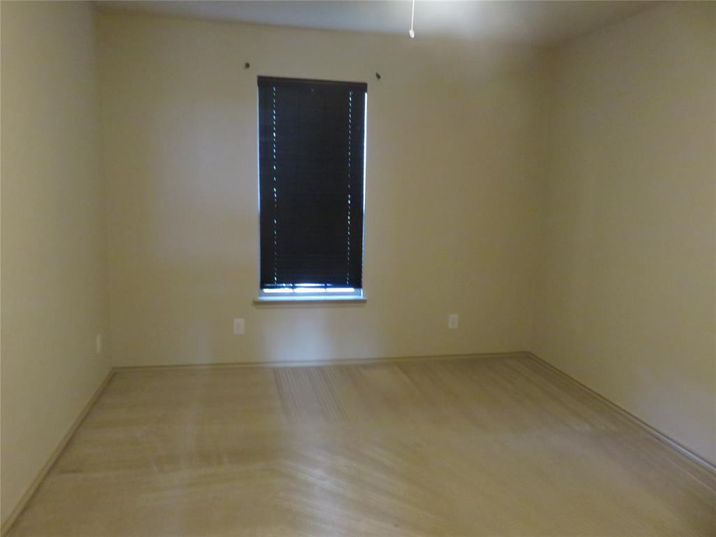 1122 Walter Stephenson Road Midlothian, TX 76065 - Photo 26 of 26 Neutral-toned walls complement the light-colored carpeting