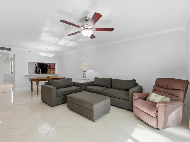 a view of a workspace with furniture and a couch