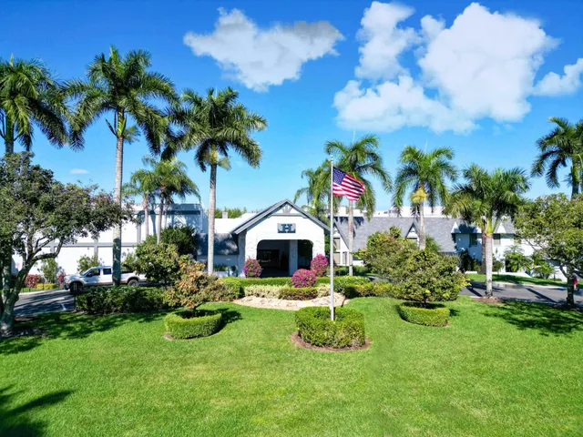 a living room with lots of furniture and a table