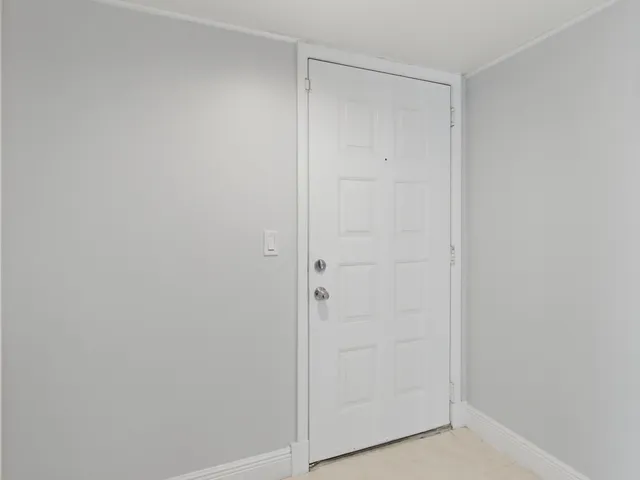 a kitchen with stainless steel appliances a refrigerator and a stove