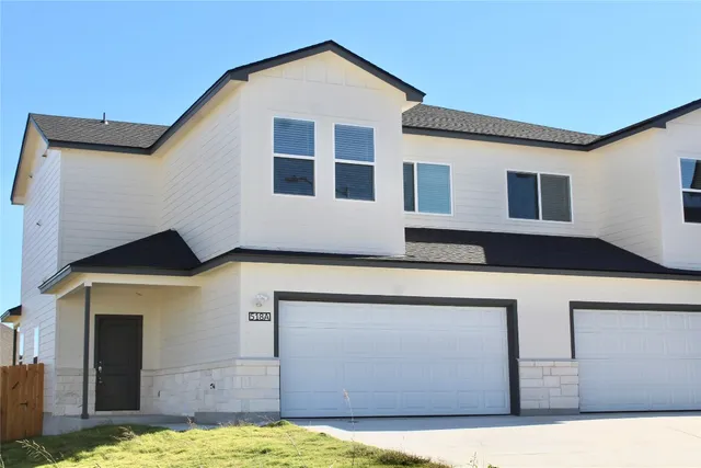 a house view with a outdoor space