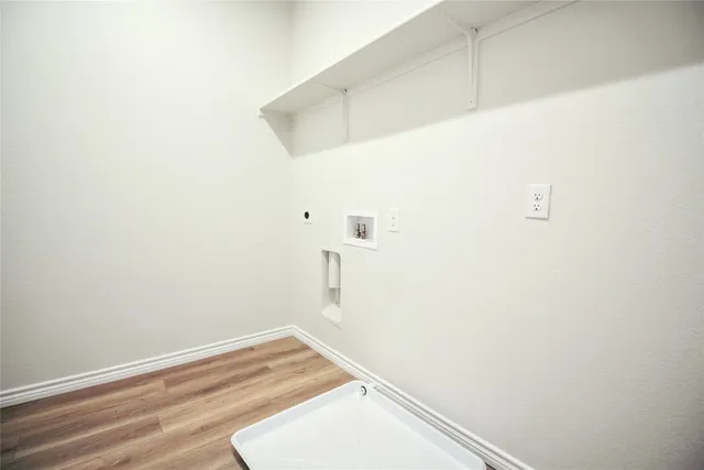 a bathroom with a sink and shower