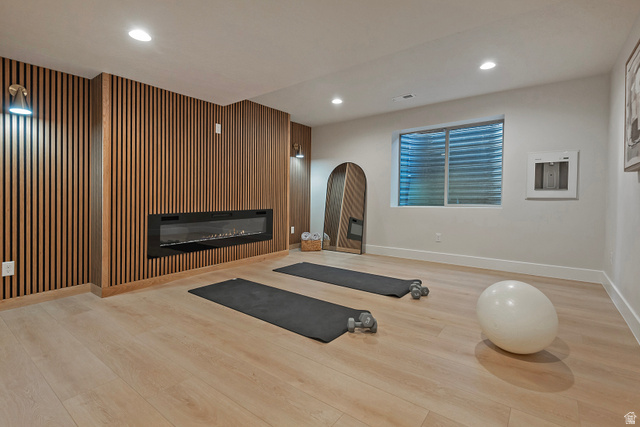 16 Gatehouse Lane Sandy, UT 84092 - Photo 42 of 73 Spa like yoga room with accent wall and fireplace