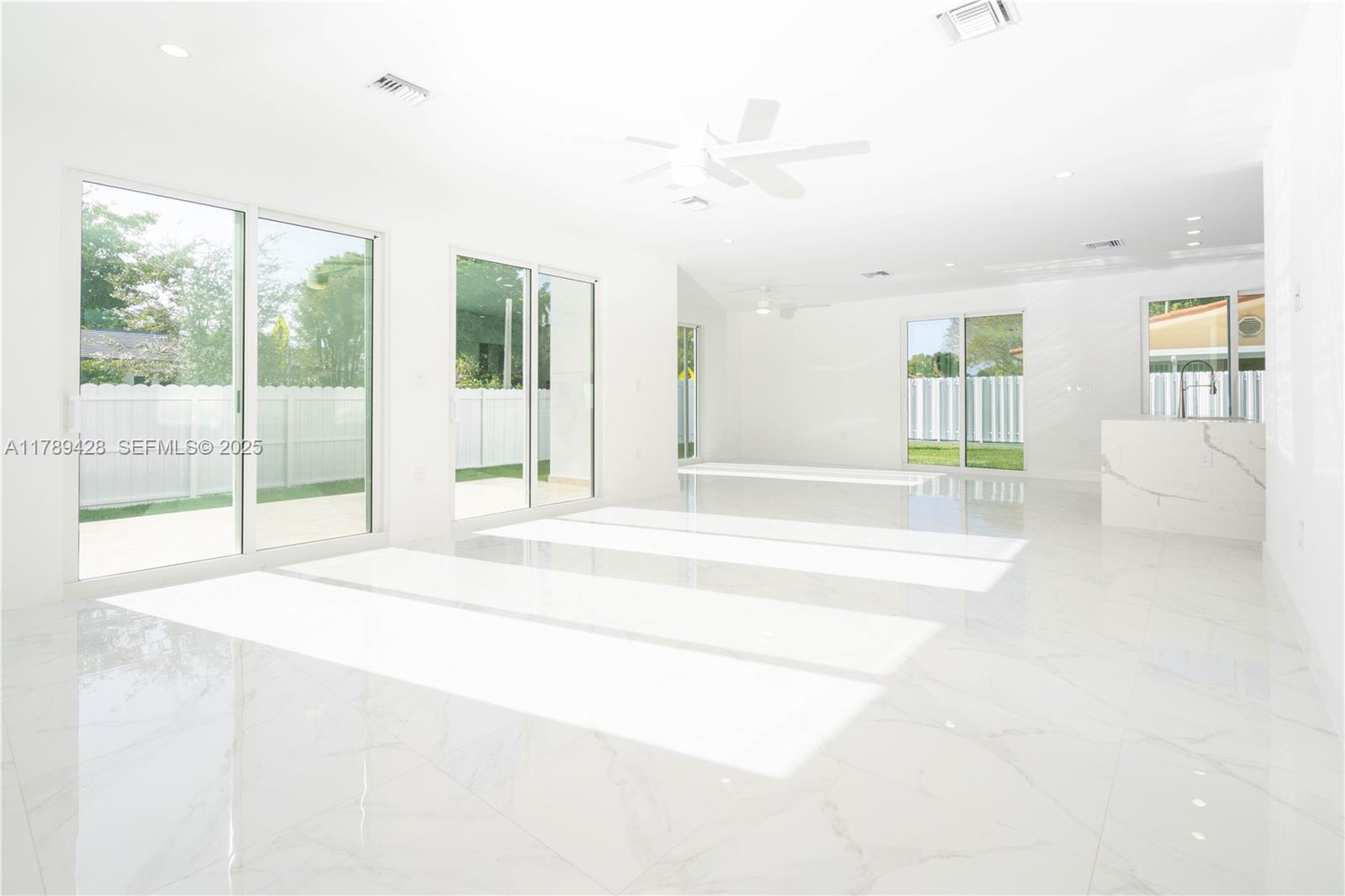 900 Southwest 24th Road Miami, FL 33129 - Photo 8 of 27 a spacious bathroom with a tub and shower
