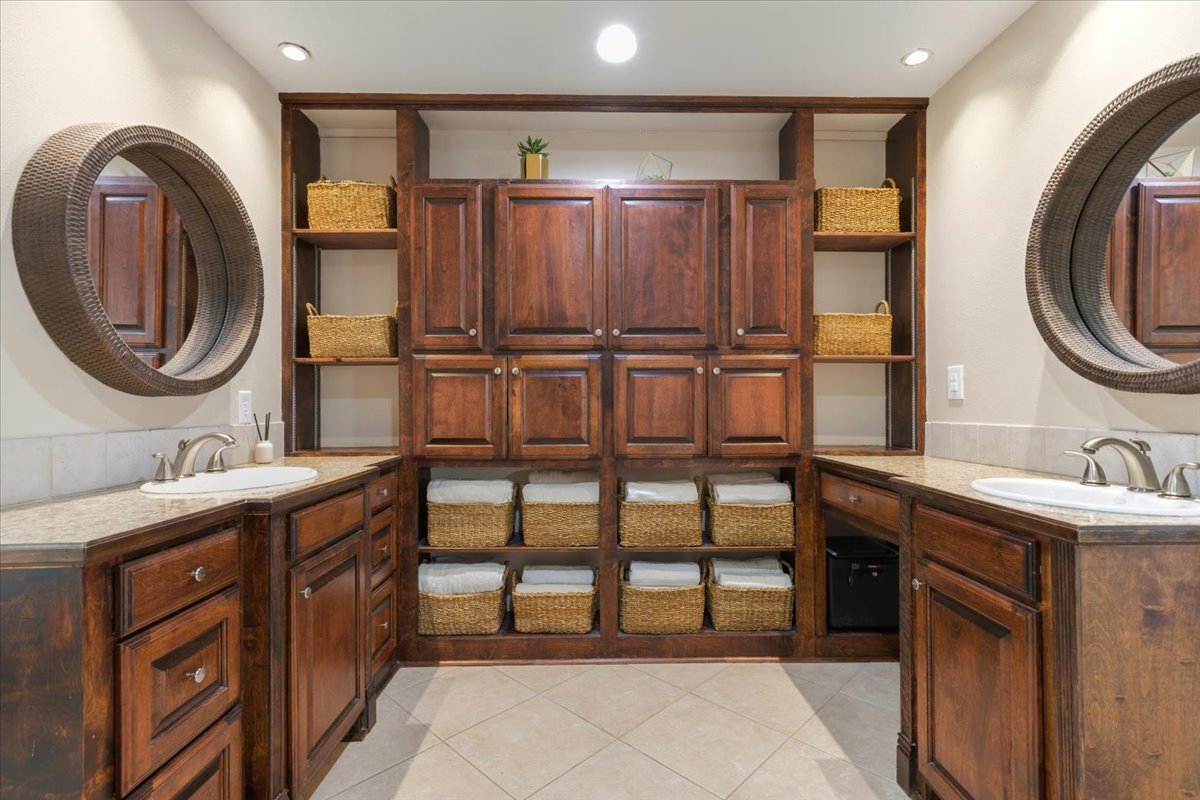 12400 Rusted Nail Cove Austin, TX 78750 - Photo 17 of 31 Thoughtful storage solutions help maximize both functionality and organization.